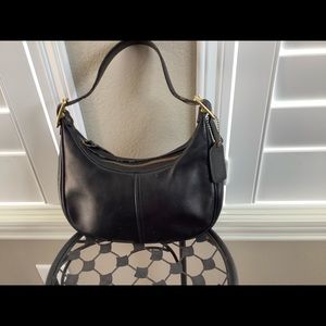 Coach black leather clutch